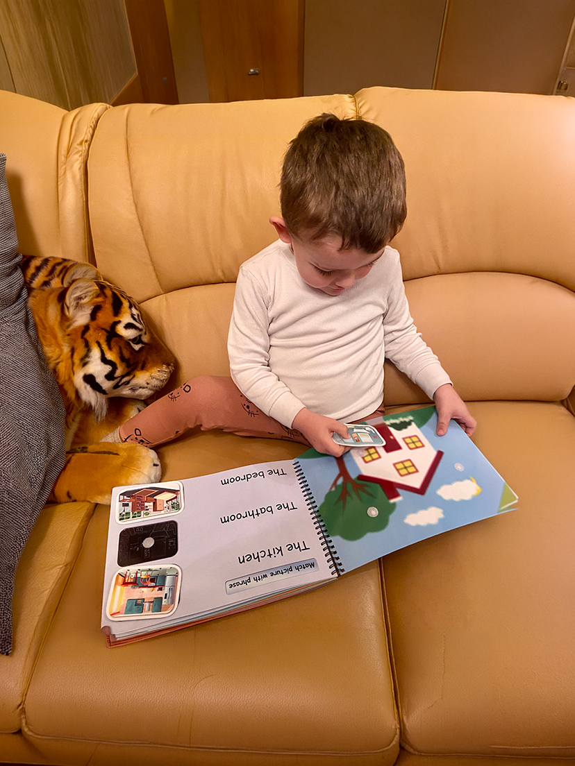 Close-up of hands using interactive pieces